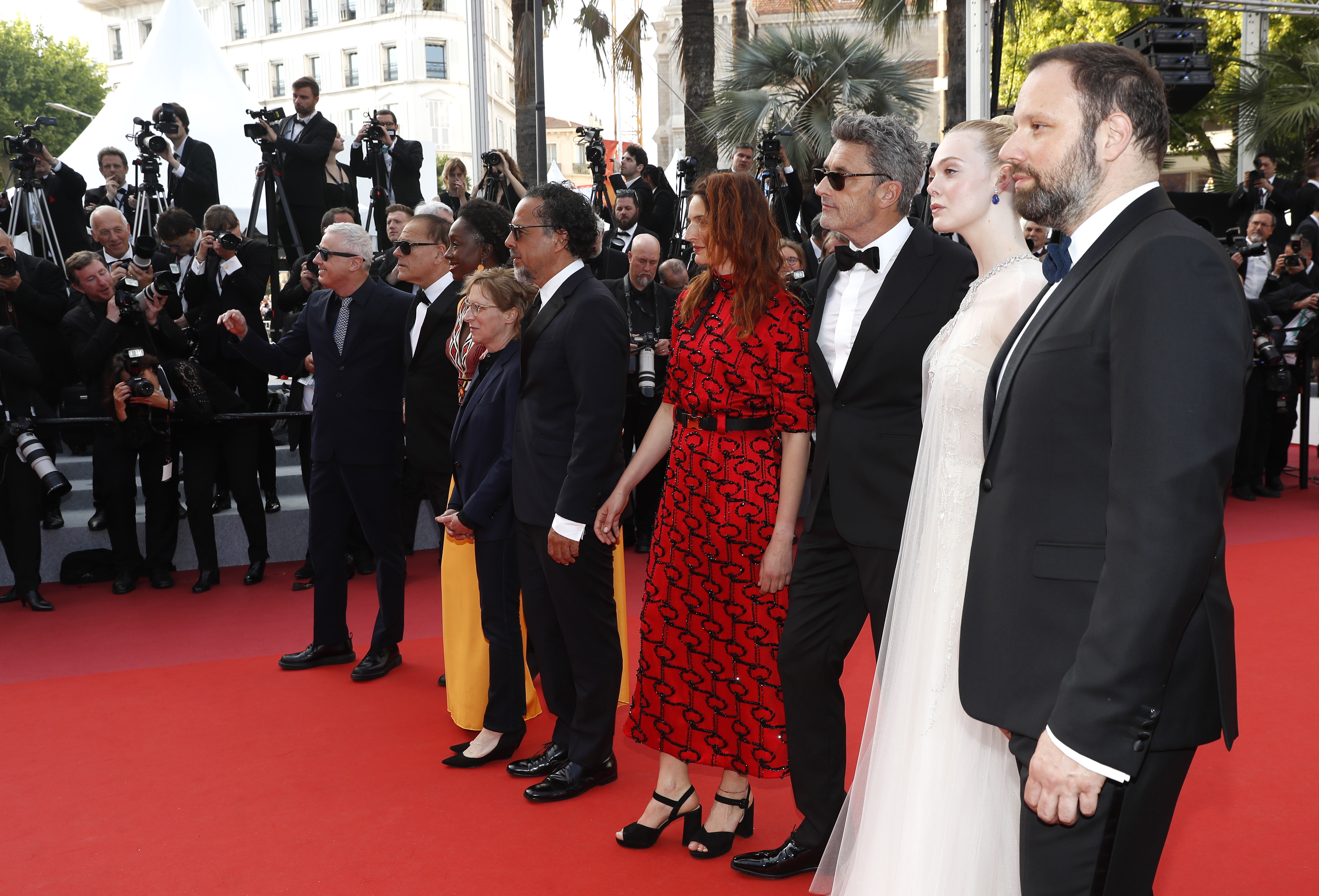 epa07600043 (L-R) Jury members, Robin Campillo, Enki Bilal, Maimouna N'Diaye, Kelly Reichardt, President of the Jury, Mexican director Alejandro Gonzalez Inarritu, Alice Rohrwacher, Pawel Pawlikowski, Elle Fanning, Yorgos Lanthimos arrive for the Closing Awards Ceremony of the 72nd annual Cannes Film Festival, in Cannes, France, 25 May 2019. The Golden Palm winning movie will be screened after the closing ceremony.  EPA/SEBASTIEN NOGIER