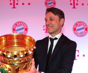epa07601790 Bayern's head coach Niko Kovac poses with the German DFB Cup trophy during the FC Bayern Muenchen DFB Cup final's night 2019 at Deutsche Telekom's representative office in Berlin, Germany, 26 May 2019.  EPA/ALEXANDER HESSENSTEIN / POOL