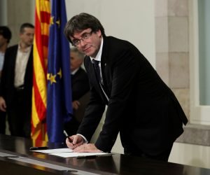 FILE PHOTO: Catalan President Carles Puigdemont signs a declaration of independence Catalan regional parliament in Barcelona FILE PHOTO: Catalan President Carles Puigdemont signs a declaration of independence at the Catalan regional parliament in Barcelona, Spain, October 10, 2017. REUTERS/Albert Gea/File Photo Albert Gea