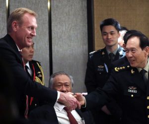 epa07616897 Acting US Secretary of Defense Patrick Shanahan (L) and Chinese Minister of Defense General Wei Fenghe (R) shakes hands during a ministerial roundtable on the sidelines of the International Institute for Strategic Studies (IISS) 18th Asia Security Summit in Singapore, 01 June 2019. The IISS Asia Security Summit is an annual gathering of defense officials in the Asia-Pacific region and is dubbed the Shangri-La Dialogue in honor of the hotel where the event is held. The summit will be held from 31 May to 02 June 2019.  EPA/WALLACE WOON