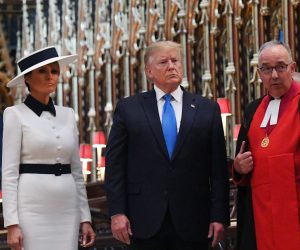 epa07622810 US President Donald J. Trump (C) with Dean of Westminster and a chaplain to the Queen Elizabeth II John Hall (R) and US First Lady Melania Trump (L) take a tour of Westminster Abbey in London, Britain, 03 June 2019. US President Trump and his wife are on a three-day official visit to the UK.  EPA/ANDY RAIN