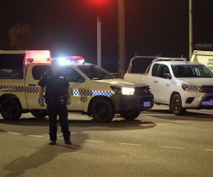 epa07624208 Police at a crime scene on the intersection of McMinn Street and Stuart Highway in Darwin, Northern Territory, Australia, 04 June 2019. According to media reports quoting the police, up to five people were killed after a shooting at a Darwin city hotel on 04 June night. A suspected gunman has been arrested, media added.  EPA/MICHAEL FRANCHI  AUSTRALIA AND NEW ZEALAND OUT