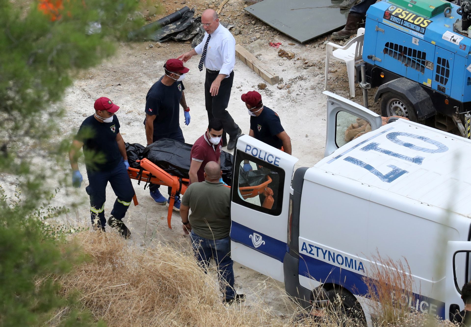 epa07624305 Investigators search for the body of Maricar Valtinez in the Red Lake in Mitsero village, Cyprus, 04 June 2019. Police are searching the lake since 53 days for the remains of the victims of a 35-year-old apparent serial killer who is leading police to his victims' remains.  EPA/KATIA CHRISTODOULOU