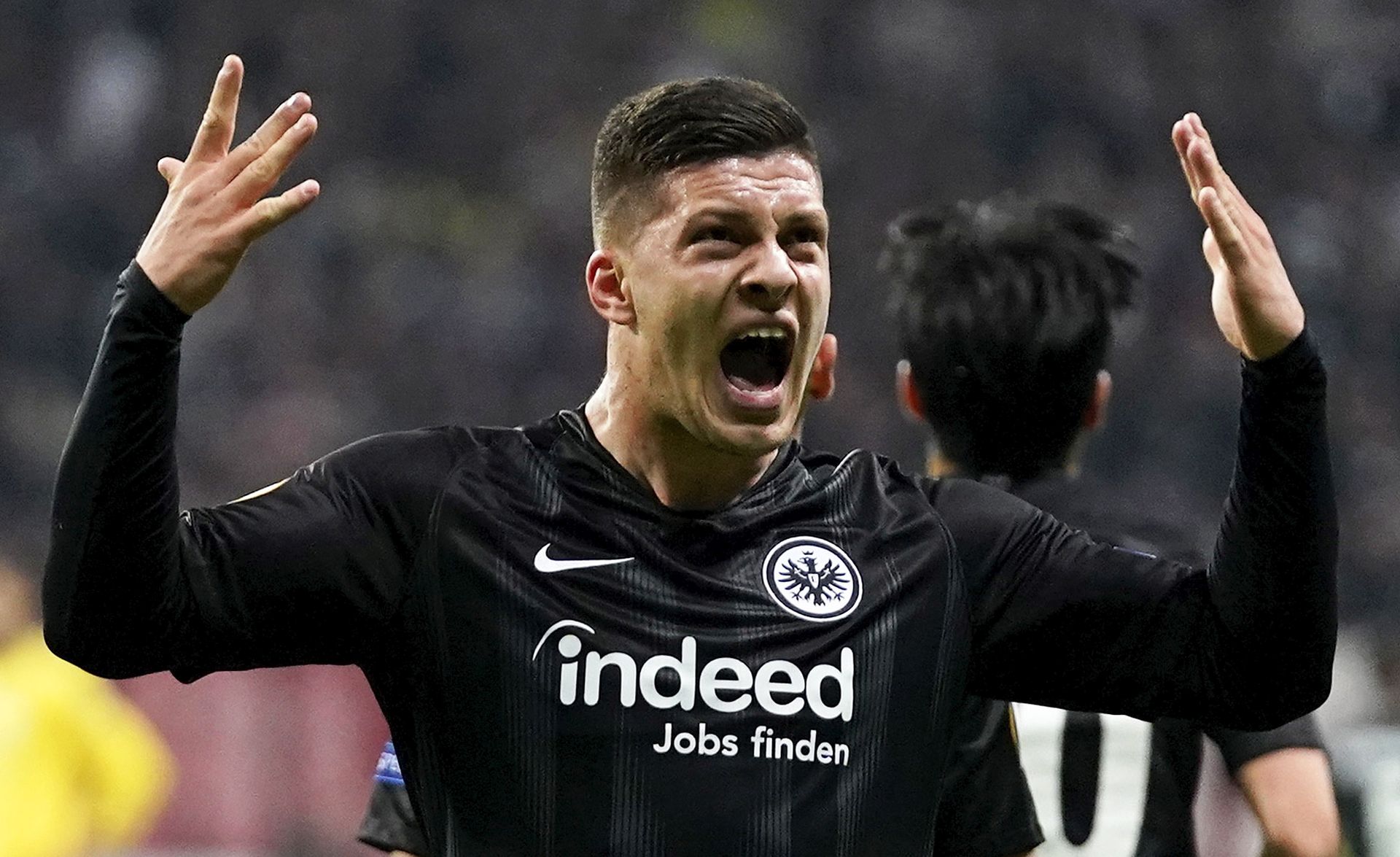 epa07624398 (FILE) - Frankfurt's Luka Jovic celebrates after scoring the opening goal during the UEFA Europa League semi final, first leg soccer match between Eintracht Frankfurt and Chelsea FC in Frankfurt, Germany, 02 May 2019 (re-issued 04 June 2019). Serbian forward Luka Jovic joins Spanish La Liga side Real Madrid for a transfer fee of reported 70 million euro, the German Bundesliga soccer club Eintracht Frankfurt confirmed on 04 June 2019. Jovic signed a six-year contract with Real Madrid.  EPA/RONALD WITTEK *** Local Caption *** 55164094