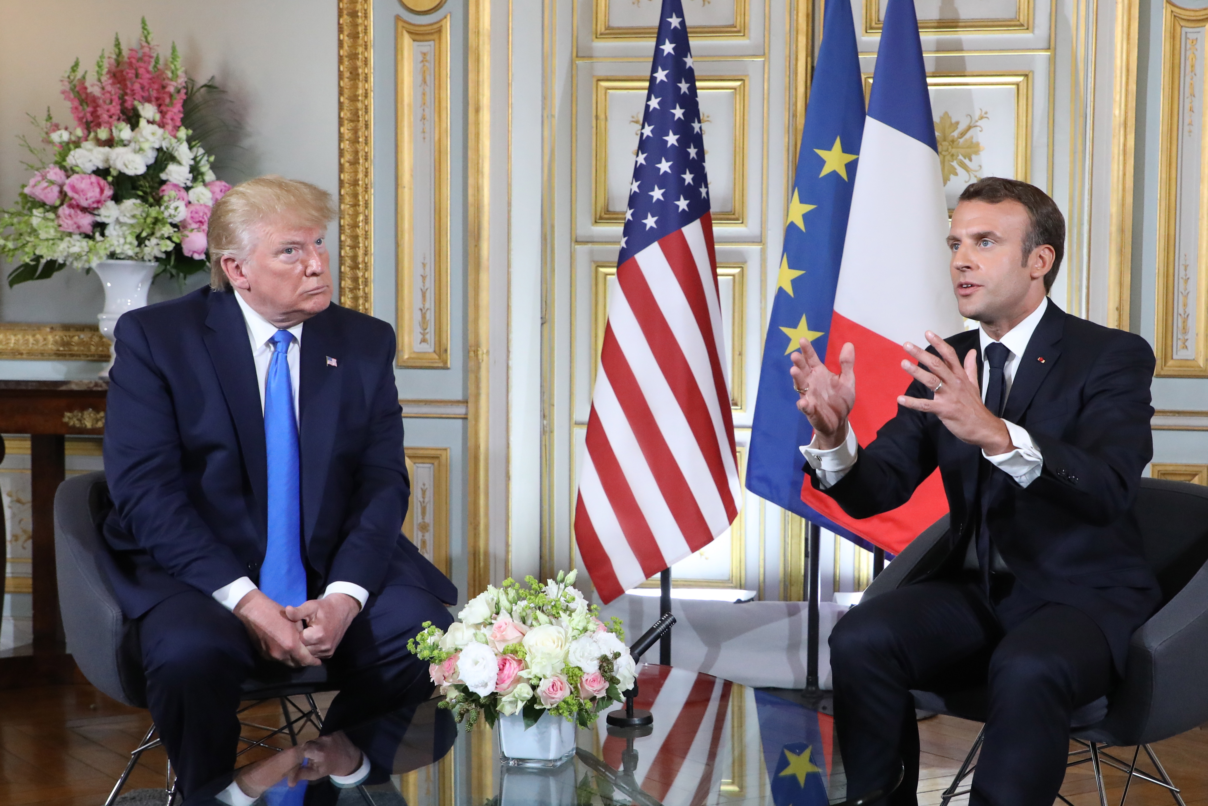 epa07630157 US President Donald Trump (L) and French President Emmanuel Macron (R) speak during a bilateral meeting on the sidelines of D-Day commemorations at the Prefecture of Caen, Normandy, France, 06 June 2019. World leaders are attending memorial events in Normandy, France to mark the 75th anniversary of the D-Day landings, which marked the beginning of the end of World War II in Europe.  EPA/LUDOVIC MARIN / POOL  MAXPPP OUT