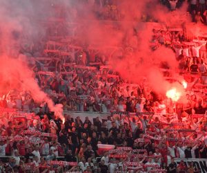 epa07633659 Poland supporters light flares before the UEFA EURO 2020, Group G qualifying soccer match between North Macedonia and Poland, in Skopje, North Macedonia, 07 June 2019.  EPA/GEORGI LICOVSKI
