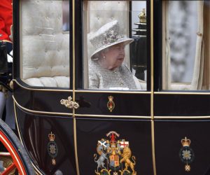 epa07634511 Britain's Queen Elizabeth II rides in a carriage during the Trooping of the Colour Queen's birthday parade, in central London, Britain, 08 June 2019. The annual official Queen's birthday parade is more popularly known as Trooping the Colour when the Queen's colour is 'trooped' in front of Her Majesty and all the Royal Colonels.  EPA/NEIL HALL