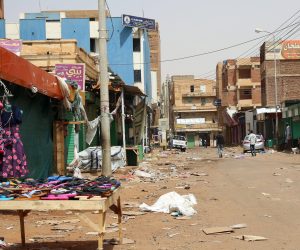 epa07636519 People walk down an empty street closed in the Omdurman market, near Khartoum, Sudan, 08 June 2019. Sudanese protest group called on demonstrators participating in the first day of the 'Civil Disobedience' campaign, which was called in the wake of a deadly attack on protesters.The Sudanese Professionals Association (SPA) said the campaign would run until a civilian government was put in charge by the country's ruling generals.  EPA/MARWAN ALI