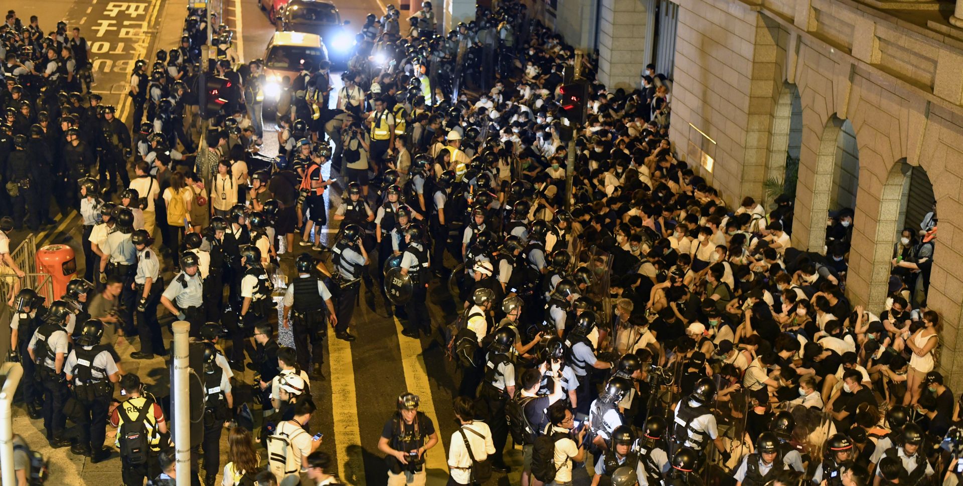 epa07638197 Protesters clash with police after a rally against amendments to an extradition bill in Hong Kong, China, 10 June 2019. Hundreds of thousands of protesters marched through the streets of Hong Kong against the bill on 09 June, in one of the biggest protest the city has seen in more than 20 years. A controversial extradition bill that would allow the transfer of fugitives to jurisdictions which Hong Kong does not have a treaty with, including mainland China has sparked the protest.  EPA/EDWIN KWOK