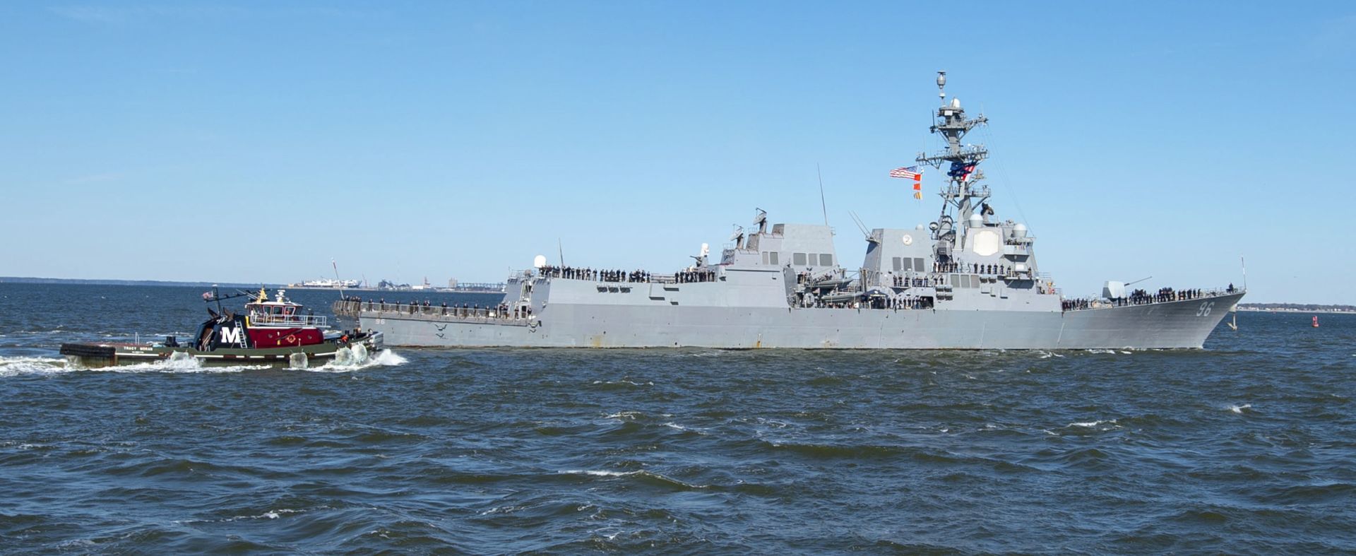epa07647423 (FILE) - A handout photo made available by the US Navy shows the Arleigh Burke-class guided-missile destroyer USS Bainbridge (DDG 96) departing Naval Station Norfolk, Virginia, USA, 01 April 2019 (reissued 14 June 2019). According to the US military, the USS Bainbridge approached and provided aid to the vessels Front Altair and Kokokua Courageous after they were damaged by suspected explosions in the Gulf of Oman on 13 June 2019. The USA have accused Iran of being responsible for the attacks while Tehran rejects the claims.  EPA/JORDAN BAIR / US NAVY HANDOUT  HANDOUT EDITORIAL USE ONLY