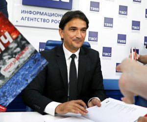 epa07647468 Croatian national soccer team head coach Zlatko Dalic signs books during the presentation of his book 'Russia of Our Dreams' on the FIFA World Cup 2018 in Moscow, Russia, 14 June 2019.  EPA/YURI KOCHETKOV