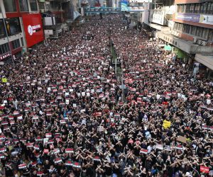 epa07651540 Protesters march to demand a complete withdrawal of an extradition bill in Hong Kong, China, 16 June 2019. A day after Hong Kong Chief Executive Carrie Lam Cheng Yuet-ngor announced a 'suspension' of a controversial extradition bill in the aftermath of violent clashes where riot police fired rubber bullets, tear gas and pepper spray at protesters, thousands took to the street asking for a complete withdrawal of the bill.  EPA/JEROME FAVRE