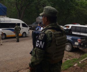 epa07653041 National Guard troops stand guard on the roads of Comitan de Dominguez, state of Chiapas, Mexico, 16 June 2019. Military officers with National Guard badges started monitoring several points and roads and trails in the highlands of the state of Chiapas a night earlier in search of migrants.  EPA/Carlos Lopez