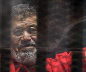 epa07654220 (FILE) - Ousted Egyptian President Mohamed Morsi looks on during a trial session on charges of espionage in Cairo, Egypt, 18 June 2016 (reissued 17 June 2019). Reports state Morsi died on 17 June 2019 during a trial session in an espionage case.  EPA/MOHAMED HOSSAM *** Local Caption *** 53980315
