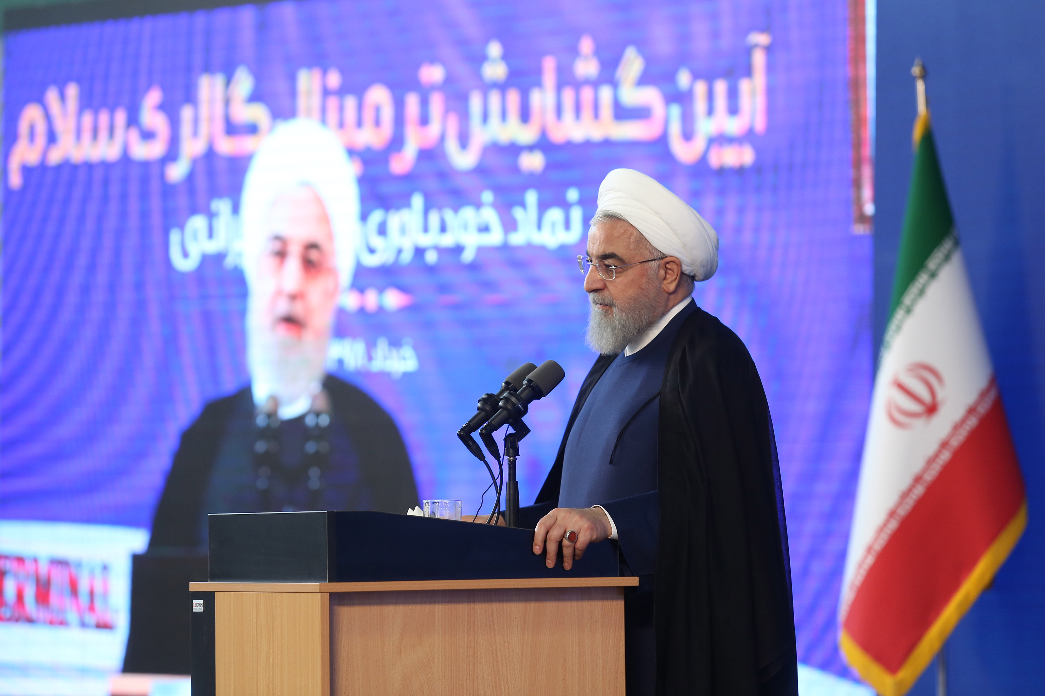epa07655224 A handout photo made available by the Presidential Office shows Iranian president Hassan Rouhani speaks during the inauguration ceremony of a new terminal at the Iran international Imam Khomeini airport outside Tehran, Iran, 18 June 2019. Media reported that Rouhani said that Iran will be the winner of the wars against the enemies, referring to the tension between Iran and the US.  EPA/HO HANDOUT  HANDOUT EDITORIAL USE ONLY/NO SALES