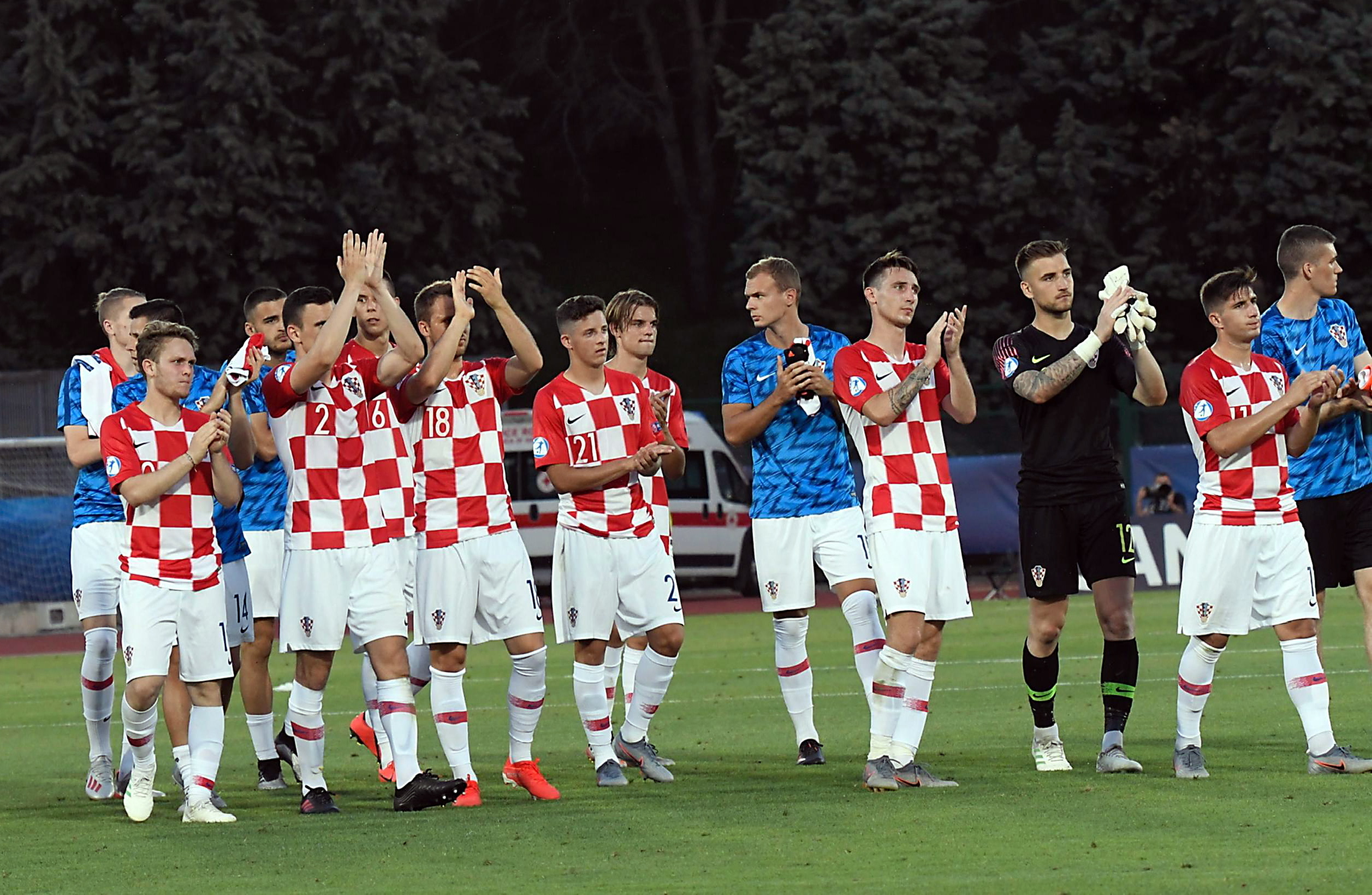 epa07656544 Croatia's players react at the end of the UEFA European Under-21 Championship 2019 Group C soccer match between Romania and Croatia in San Marino, 18 June 2019.  EPA/LUCA FANFANI
