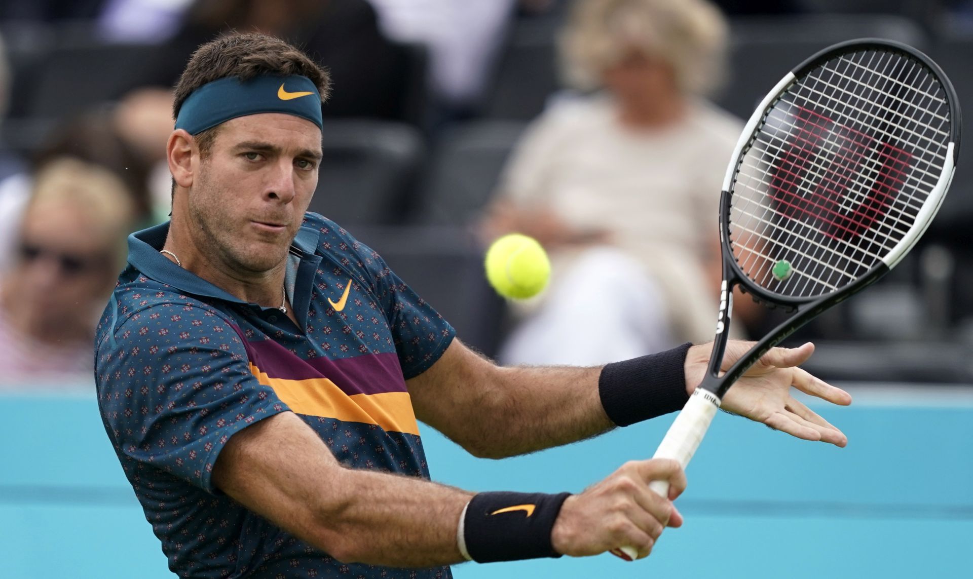 epa07657961 Argentina's Juan Martin del Potro serves to Canada's Denis Shapovalov during their round 32 match at the Fever Tree Championship at Queen's Club in London, Britain, 19 June 2019. The tournament runs from 17th June till 23 June 2019.  EPA/WILL OLIVER