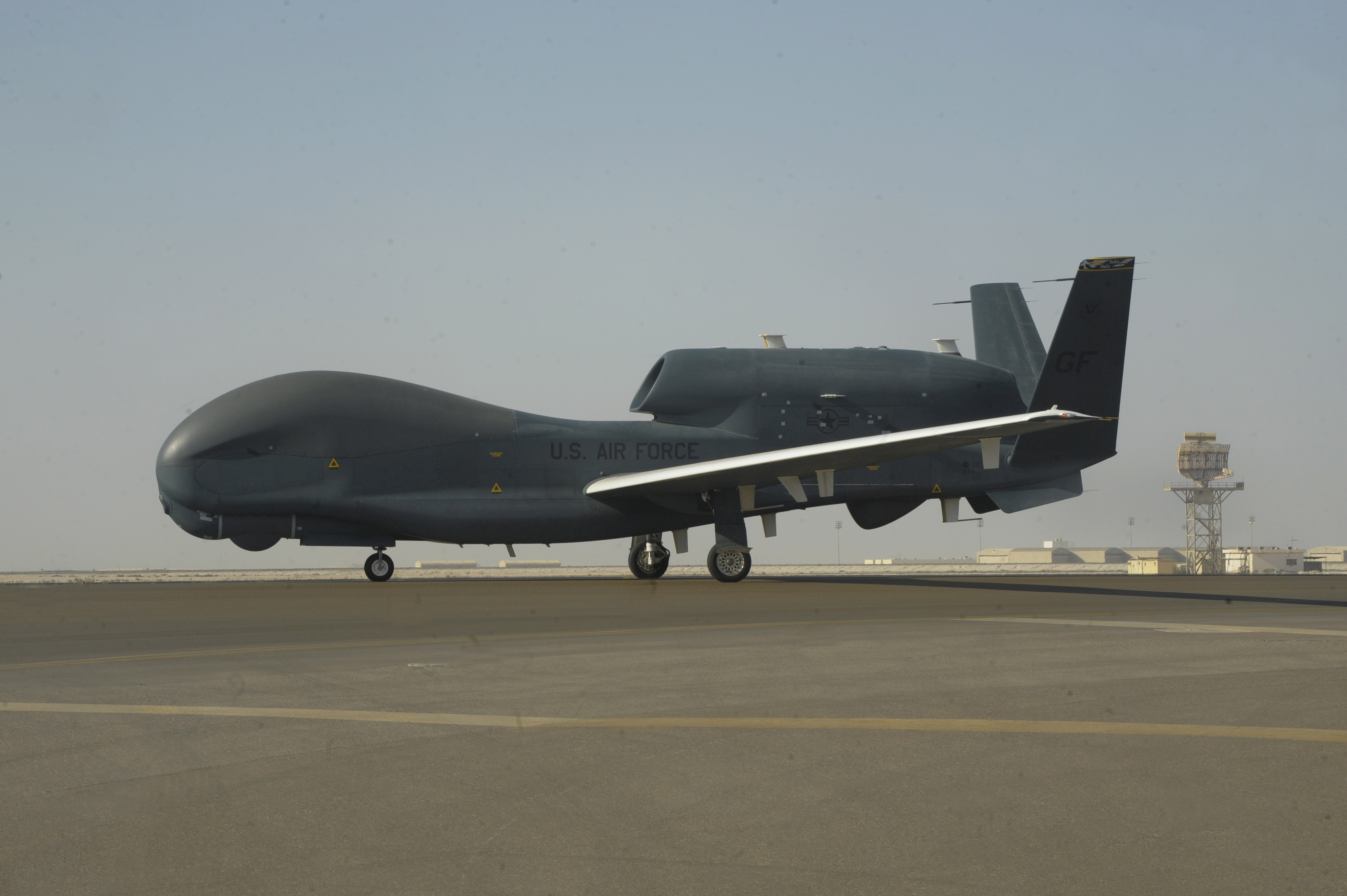 epa07660711 A handout photo made available by the US Air Force shows a RQ-4 Global Hawk unmanned airccraft at Al Dhafra Air Base, United Arab Emirates, 13 February 2019 (issued 20 June 2019). Media reports on 20 June 2019 state that Iran's Islamic Revolution Guards Corps (IRGC) claim to have shot down a US spy drone over Iranian airspace, near Kuhmobarak in Iran's southern Hormozgan province. The US military has confirmed one of their drones was hit by an Iranian missile.  EPA/Darrion Brownin / US AIR FORCE HANDOUT  HANDOUT EDITORIAL USE ONLY/NO SALES