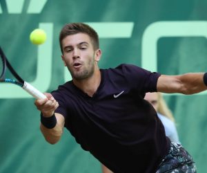epa07663807 Borna Coric from Croatia in action against Pierre-Hugues Herbert from France in their quarter final match at the ATP Tennis Tournament Noventi Open (former Gerry Weber Open) in Halle Westphalia, Germany, 21 June 2019.  EPA/FOCKE STRANGMANN