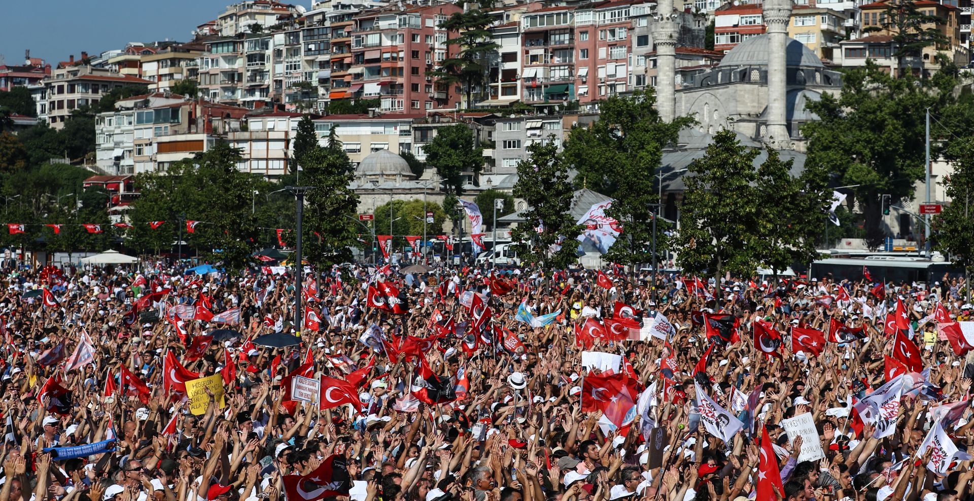 epa07666542 Supporters of Republican People's Party 'CHP' candidate for Istanbul mayor Ekrem Imamoglu during his repeated election campaign rally in Istanbul, Turkey, 22 June 2019. According to media reports, the Turkish Electoral Commission has ordered a repeat of the mayoral election in Istanbul on 23 June, after Turkish President Recep Tayyip Erdogan's AK Party had alleged there was 'corruption' behind his party losing.  EPA/SEDAT SUNA