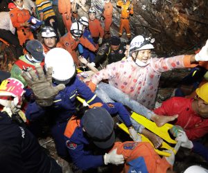 epa07666868 A Cambodian rescue team carries an injured worker at the site of a collapsed building at a construction site in Preah Sihanouk province, Cambodia, 23 June 2019. A new seven-story building owned by a Chinese company, collapsed in Preah Sihanouk province, killing at least 15 workers and leaving 24 workers injured.  EPA/MAK REMISSA