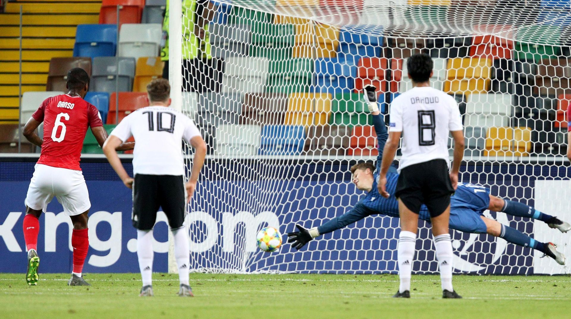 epa07669440 Austria's Kevin Danso (L) scores from the penalty spot the goal 1-1 during the Uefa European Under-21 Championship 2019 - Group B match between Austria and Germany in Udine, Italy, 23 June 2019.  EPA/GABRIELE MENIS