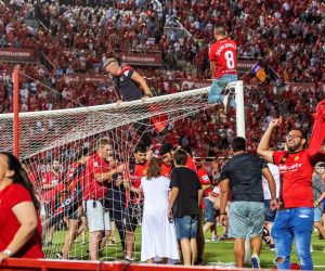 epa07669837 Mallorca FC fans celebrate the promotion of their team to first division after their victory against Deportivo de la Coruna in Palma de Mallorca, Spain, 23 June 2019 (issued 24 June 2019). Mallorca FC managed the promotion to the first division league after beating Deportivo de la.  EPA/CATI CLADERA