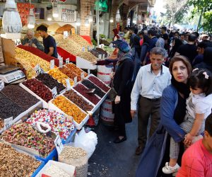 epa07670600 An Iranian woman looks at dry goods displayed at old grand bazaar in Tehran, Iran, 24 June 2019. Iranian media has reported that as Iranians suffer from the sanctions and economic crisis which has affected their lives, US administration is to announce further sanctions against Iran in coming hours. The new sanctions are coming after a US drone was shot down by Iranian forces on 20 January 2019.  EPA/ABEDIN TAHERKENAREH