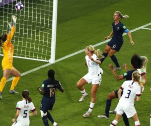 epa07681055 Wendie Renard (C-R) of France scores her team's first goal during the FIFA Women's World Cup 2019 quarter final soccer match between France and the USA in Paris, France, 28 June 2019.  EPA/IAN LANGSDON