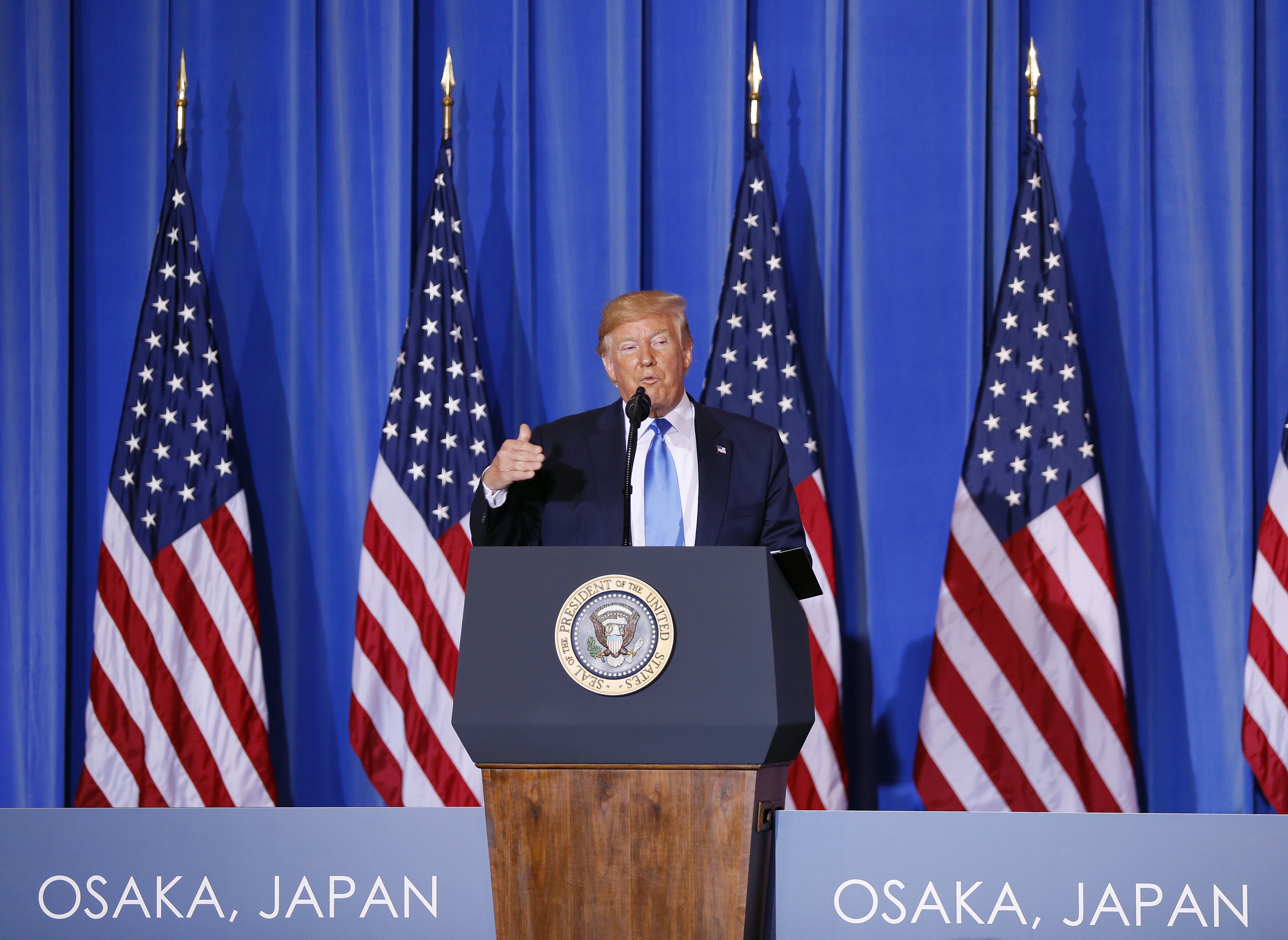 epa07681911 US President Donald J. Trump speaks during a news conference at a hotel in Osaka, western Japan, 29 June 2019 after closing the G20 Summit talks. It is the first time that Japan hosts a G20 summit. The summit gathers leaders from 19 countries and the European Union to discuss topics such as global economy, trade and investment, innovation and employment  EPA/KIMIMASA MAYAMA