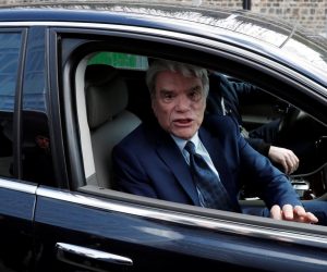 French businessman Bernard Tapie arrives in his car for a trial over a disputed state payment at the Paris courthouse French businessman Bernard Tapie arrives in his car for a trial over a disputed state payment at the Paris courthouse, France, March 11, 2019. REUTERS/Benoit Tessier BENOIT TESSIER