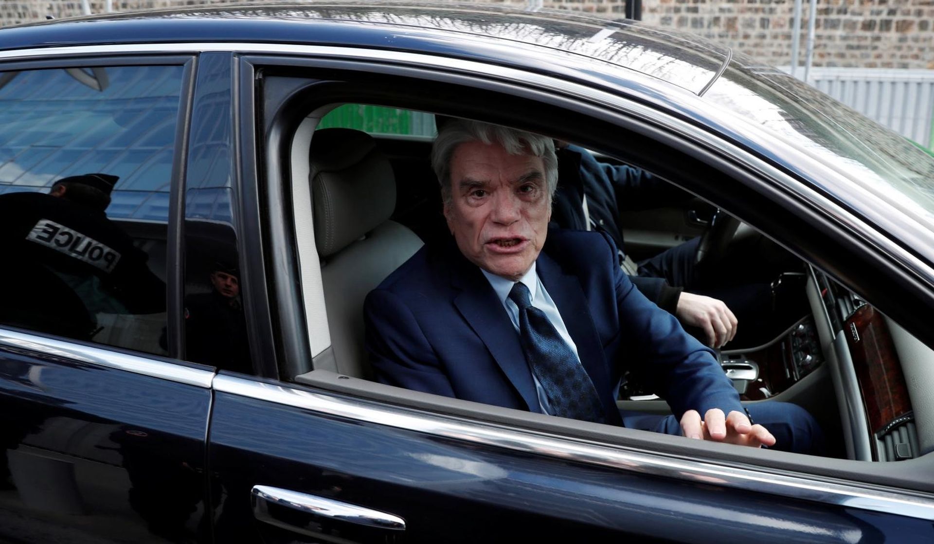French businessman Bernard Tapie arrives in his car for a trial over a disputed state payment at the Paris courthouse French businessman Bernard Tapie arrives in his car for a trial over a disputed state payment at the Paris courthouse, France, March 11, 2019. REUTERS/Benoit Tessier BENOIT TESSIER