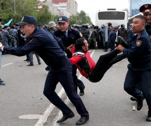 epa07636650 Police detain opposition supporters during a protest calling for free and fair elections during the presidential elections in Nur-Sultan (formerly known as Astana), Kazakhstan, 09 June 2019.  EPA/IGOR KOVALENKO