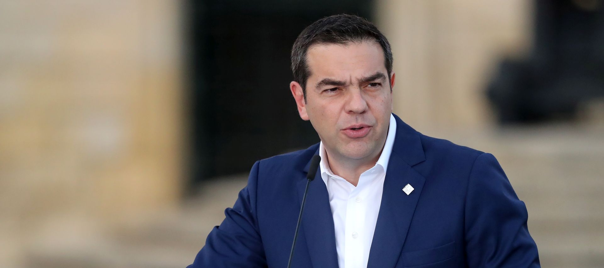 epa07648772 Alexis Tsipras, Greek Prime Minister speaks during the Southern European Countries Summit MED7 (Cyprus, France, Italy, Greece, Portugal, Malta and Spain) press conference at the  Auberge de Castille in Valletta, Malta, 14 June 2019.  EPA/DOMENIC AQUILINA