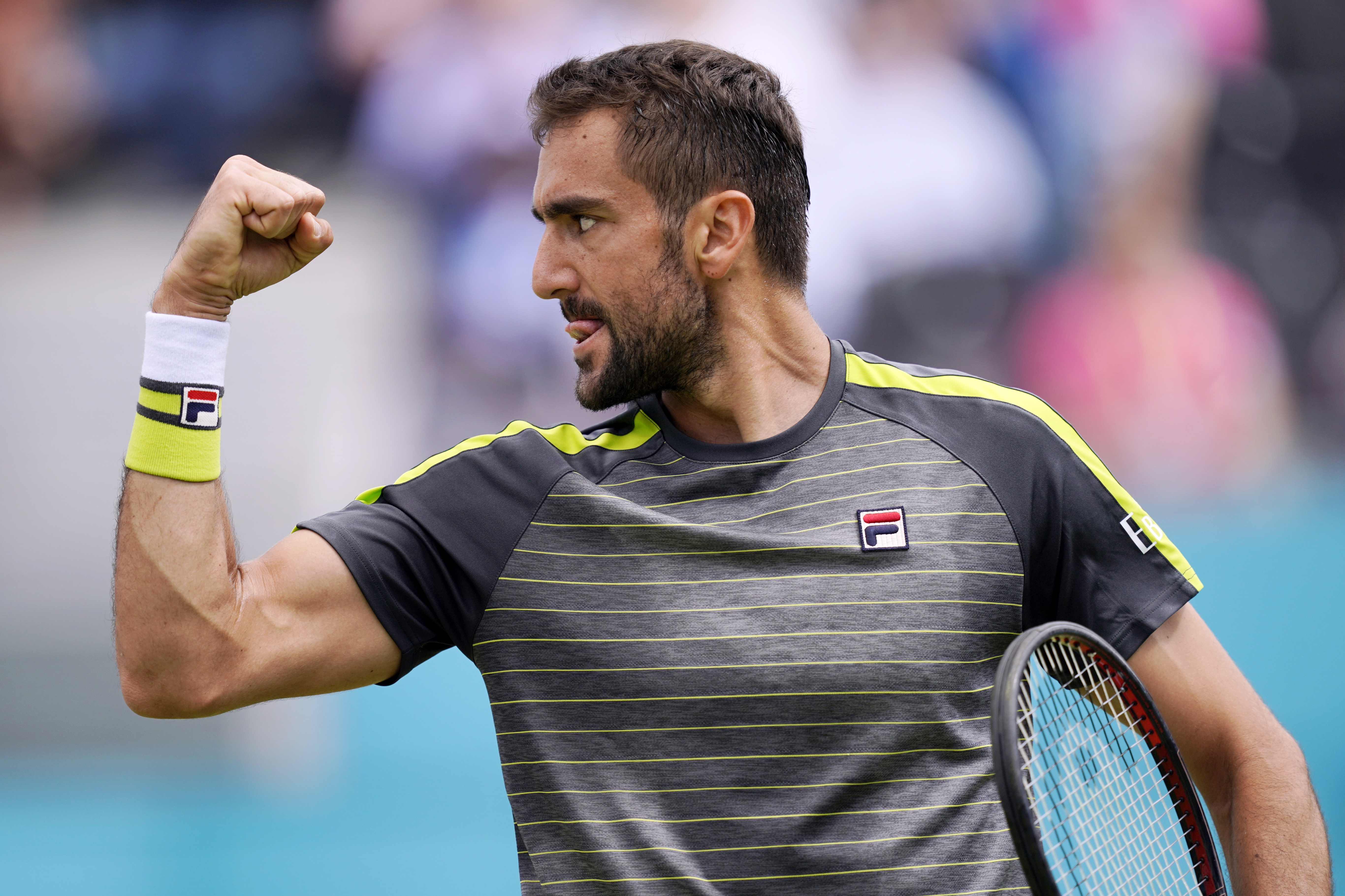 epa07654054 Croatia's Marin Cilic reacts during his round 32 match against Chile's Cristian Garin at the Fever Tree Championship at Queen's Club in London, Britain, 17 June 2019. The tournament runs from 17th June till 23 June 2019.  EPA/WILL OLIVER