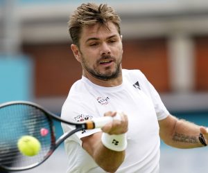 epa07660842 Switzerland' s Stan Wawrinka returns to Nicolas Mahut of France during their round 16 match at the Fever Tree Championship at Queen's Club in London, Britain, 20 June 2019.  EPA/WILL OLIVER