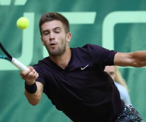 epa07663807 Borna Coric from Croatia in action against Pierre-Hugues Herbert from France in their quarter final match at the ATP Tennis Tournament Noventi Open (former Gerry Weber Open) in Halle Westphalia, Germany, 21 June 2019.  EPA/FOCKE STRANGMANN
