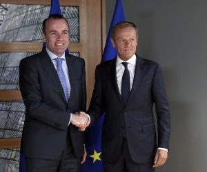 epa07669971 European Parliament chair of the EPP Party Manfred Weber (L) is welcomed by European Council President Donald Tusk (R), prior to their meeting at the Europa building in Brussels, Belgium, 24 June 2019.  EPA/VIGINIA MAYO / POOL
