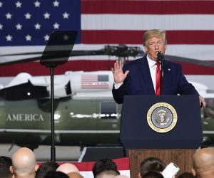 epa07684239 US President Donald J. Trump (C) speaks during a meeting with soldiers of the United States Forces in Korea (USFK) at the Osan Air Base in Pyeongtaek, Gyeonggi-do, South Korea, 30 June 2019.  The US leader arrived in South Korean on 29 June for a two-day visit that included a meeting with South Korean President Moon Jae-in and North Korean leader Kim Jong-un in the Demilitarized Zone that separates the two Koreas.  EPA/KIM MIN-HEE