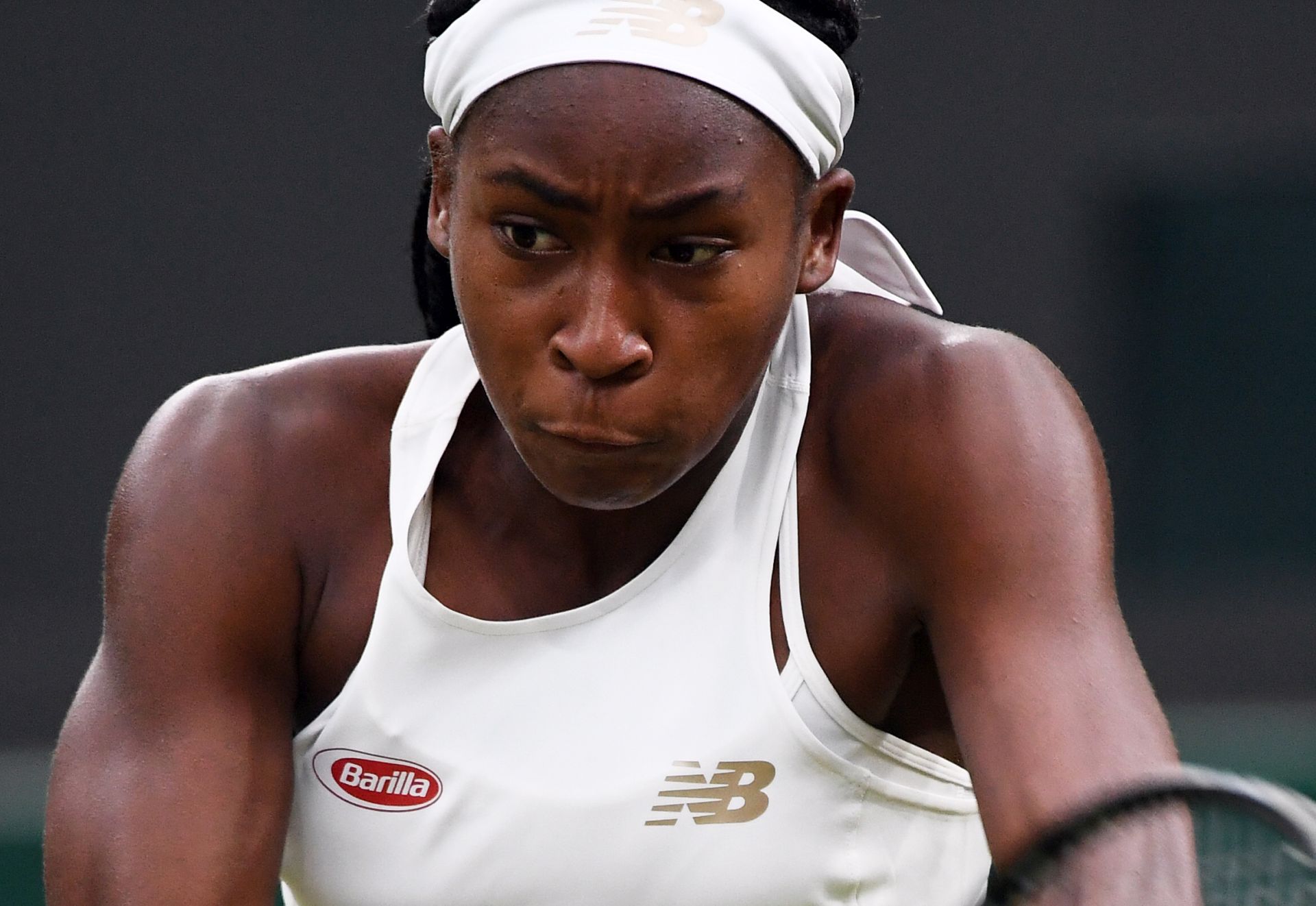 epa07693090 Cori Gauff of the US returns to Magdalena Rybarikova of Slovakia in their second round match during the Wimbledon Championships at the All England Lawn Tennis Club, in London, Britain, 03 July 2019. EPA/ANDY RAIN EDITORIAL USE ONLY/NO COMMERCIAL SALES