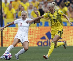 epa07699438 Alex Greenwood (L) of England in action against Sofia Jakobsson (R) of Sweden during the FIFA Women's World Cup 2019 soccer match for third place between England vs Sweden in Nice, France, 06 July 2019.  EPA/SEBASTIEN NOGIER