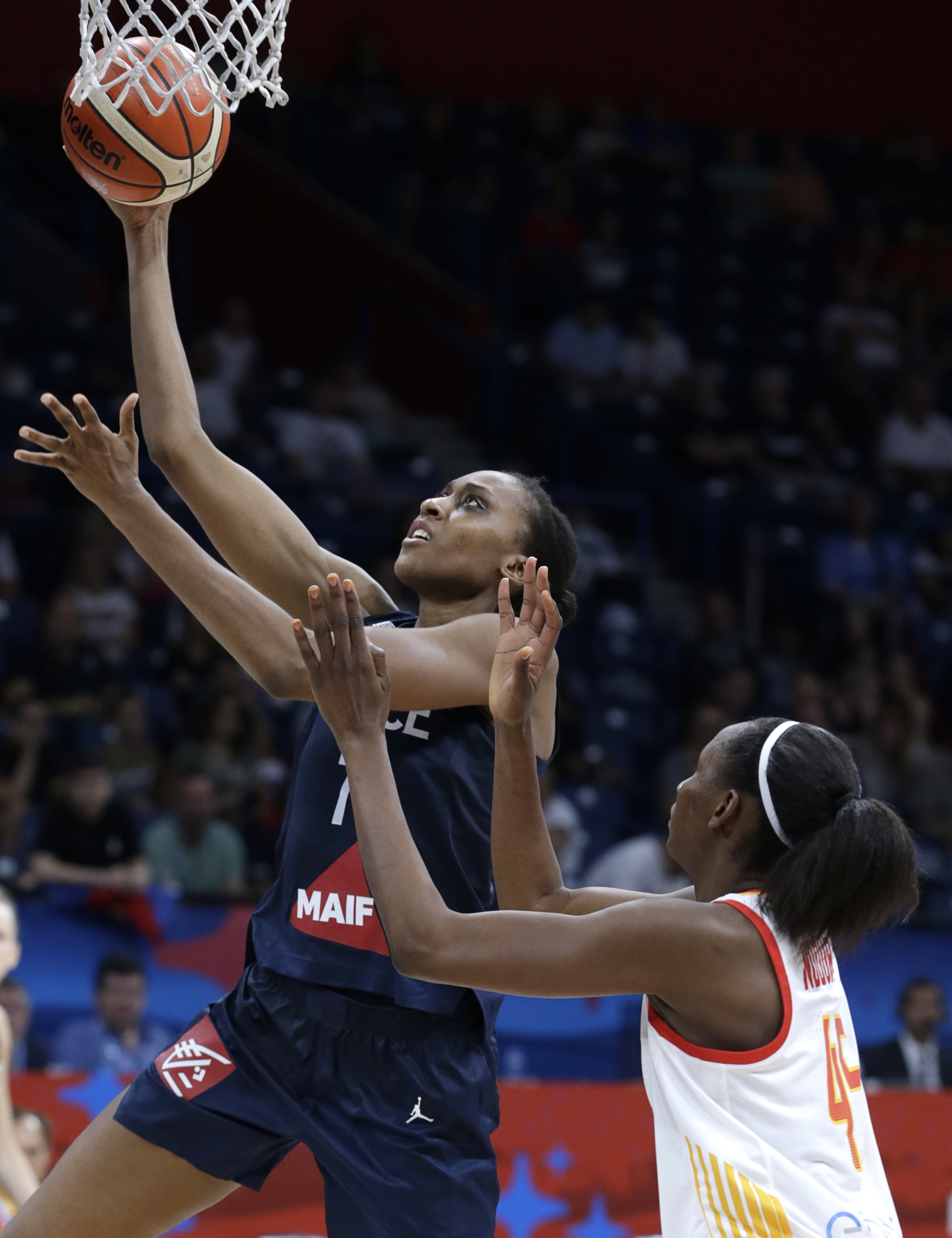 epa07702072 Sandrine Gruda (L) of France in action against Astou Ndour (R) of Spain during the FIBA Women's Eurobasket 2019 final match between Spain and France in Belgrade, Serbia, 07 July 2019.  EPA/ANDREJ CUKIC