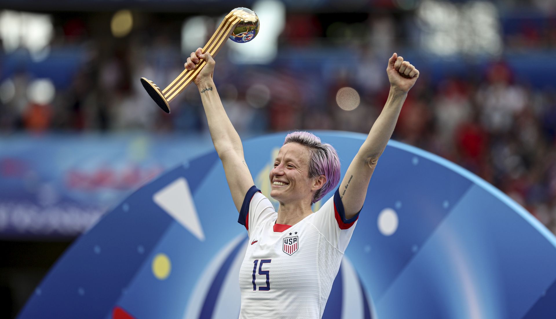 epa07701884 Megan Rapinoe of the USA poses for photographs during the ceremony of the FIFA Women's World Cup 2019 final soccer match between USA and Netherlands in Lyon, France, 07 July 2019.  EPA/SRDJAN SUKI