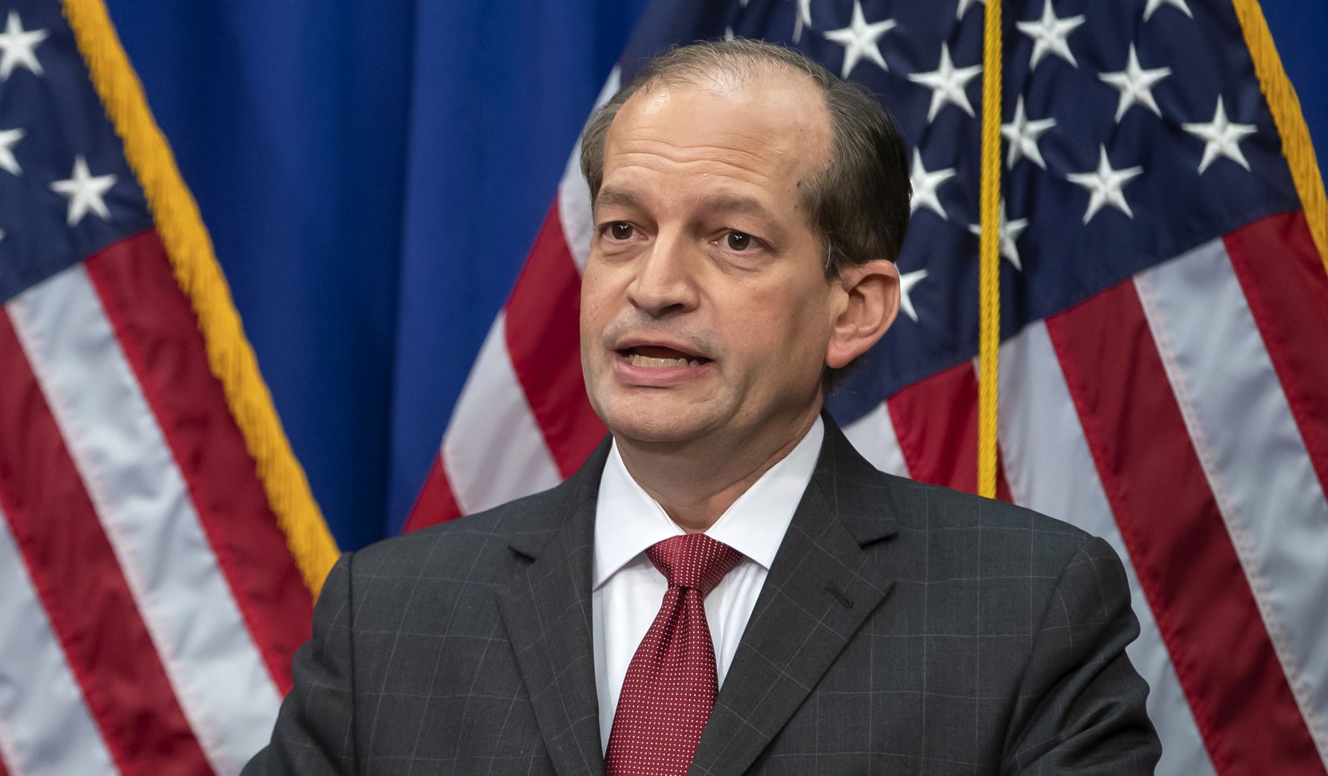 epa07708634 US Secretary of Labor Alex Acosta speaks at a news conference at the Department of Labor in Washington, DC, USA, 10 July 2019. Acosta has come under fire for his role in a plea deal for Jeffrey Epstein in 2008. Epstein was recently arrested and charged with sex trafficking of minors.  EPA/ERIK S. LESSER