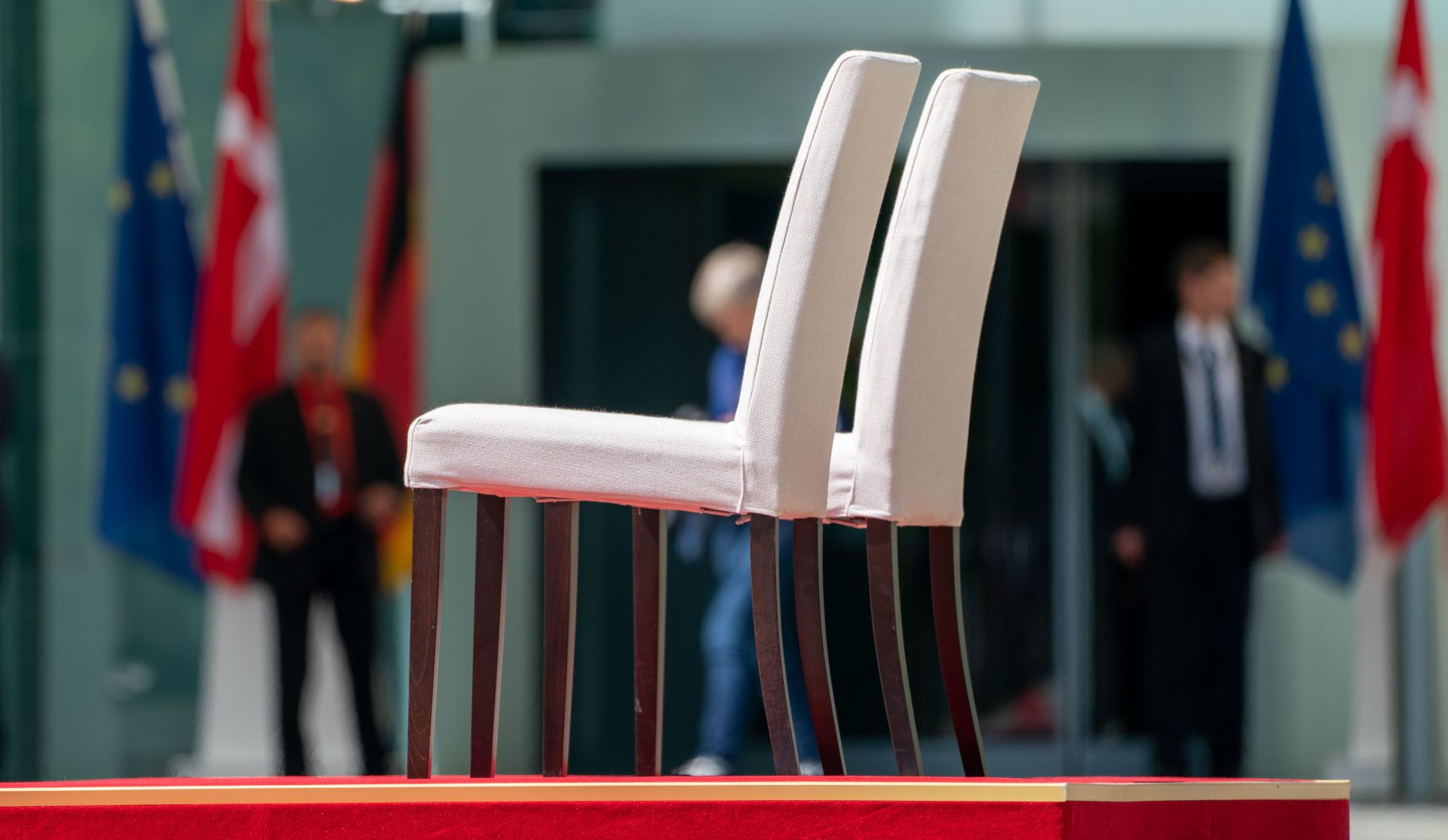 11 July 2019, Berlin: Two chairs are seen on the pedestal at the yard of the German Chancellery, before German Chancellor Angela Merkel receives Danish Prime Minister Mette Frederiksen during a ceremonial welcome. Photo: Michael Kappeler/dpa