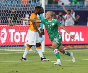 epa07710477 Sofiane Feghouli of Algeria celebrates goal  during the 2019 Africa Cup of Nations quarterfinal match between Ivory Coast and Algeria at Suez Stadium, Suez, Egypt on 11 July 2019.  EPA/GAVIN BARKER