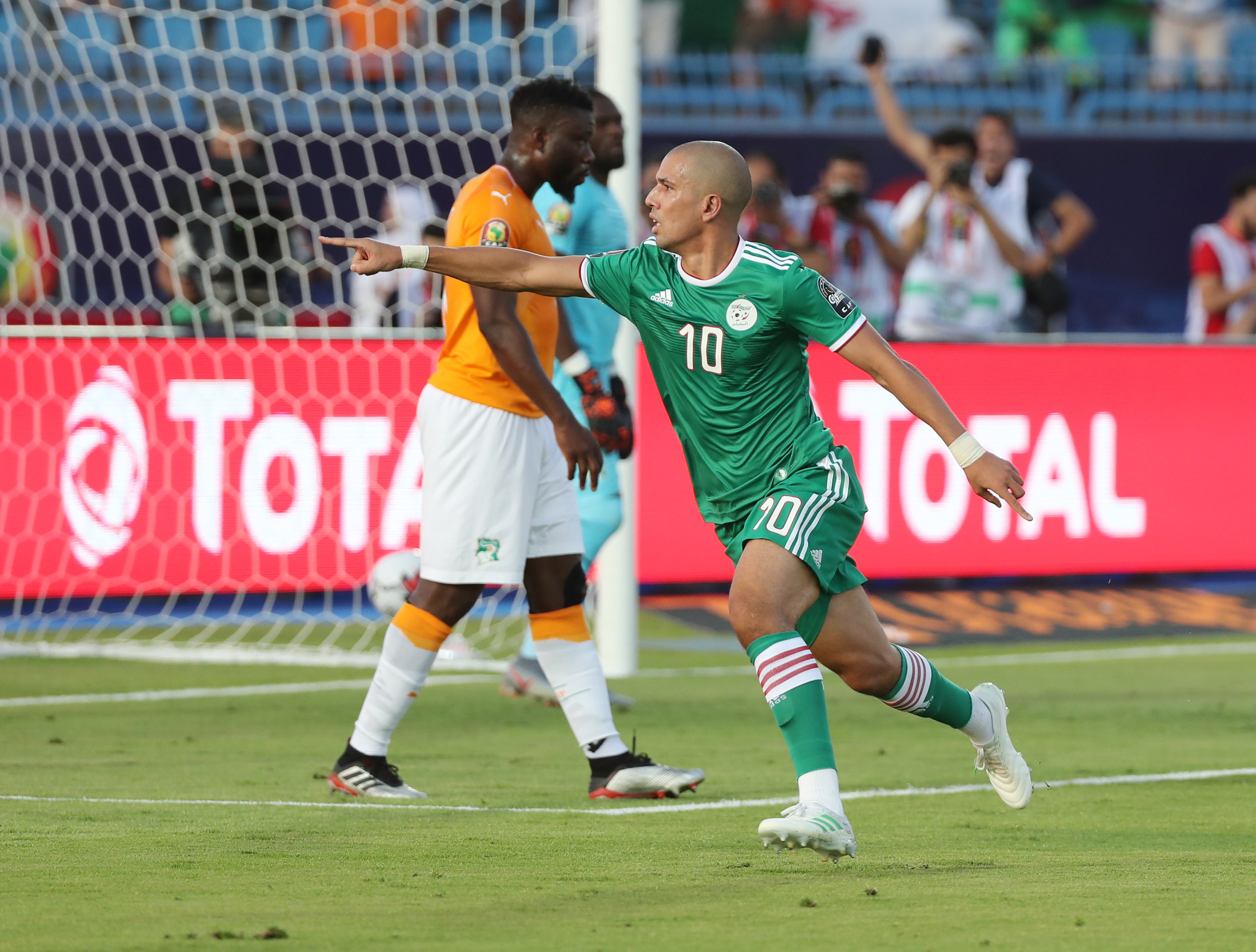 epa07710477 Sofiane Feghouli of Algeria celebrates goal  during the 2019 Africa Cup of Nations quarterfinal match between Ivory Coast and Algeria at Suez Stadium, Suez, Egypt on 11 July 2019.  EPA/GAVIN BARKER