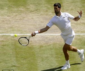 epa07712465 Novak Djokovic of Serbia in action against Roberto Bautista Agut of Spain during their semi final match for the Wimbledon Championships at the All England Lawn Tennis Club, in London, Britain, 12 July 2019. EPA/Tim Ireland / POOL EDITORIAL USE ONLY/NO COMMERCIAL SALES