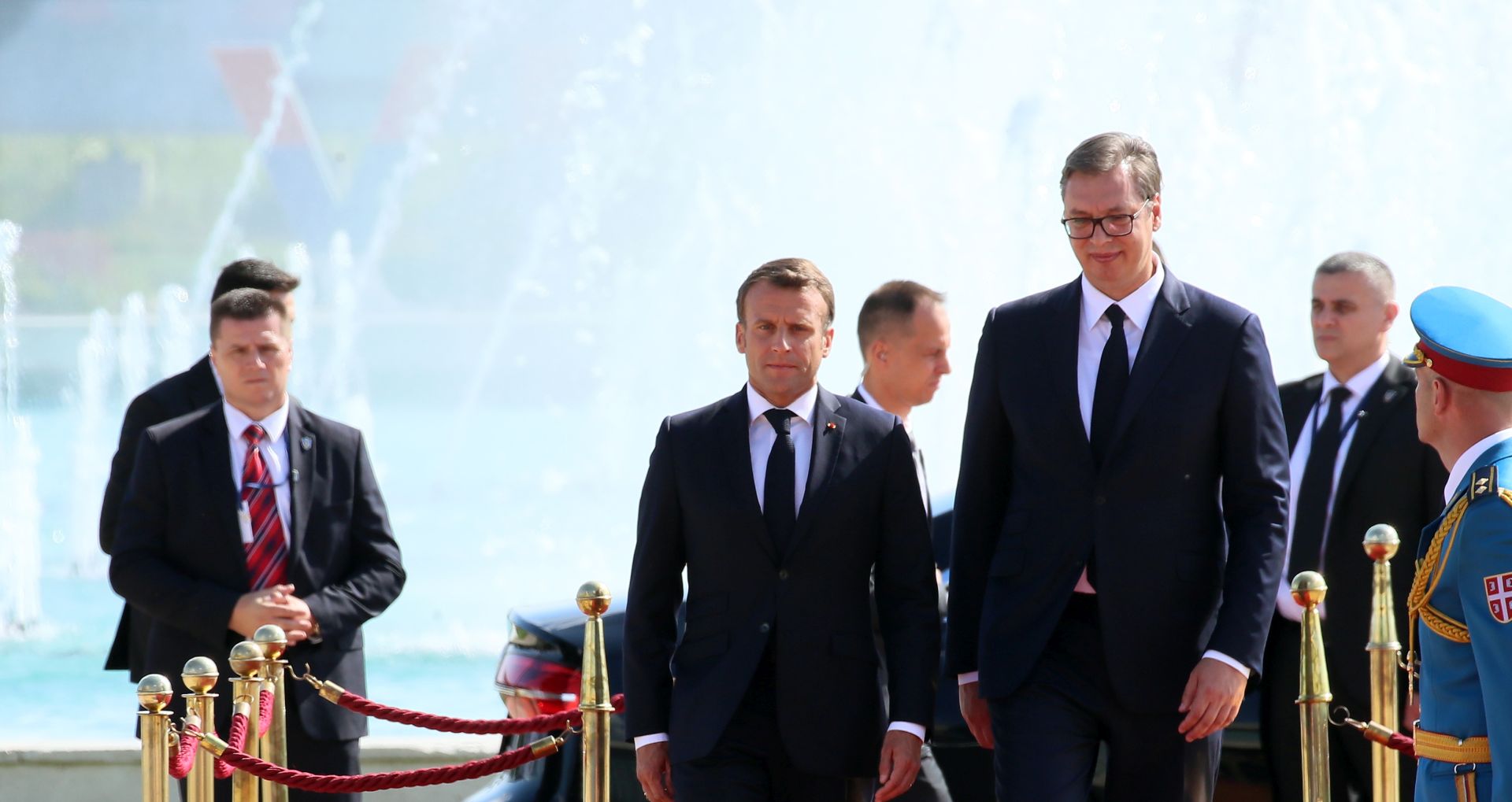 epa07718880 French President Emmanuel Macron (L) and Serbian president Aleksandar Vucic (R) attend a welcome ceremony during his visit in Belgrade, Serbia, 15 July 2019. President Macron is on a two-day state visit to Serbia.  EPA/KOCA SULEJMANOVIC
