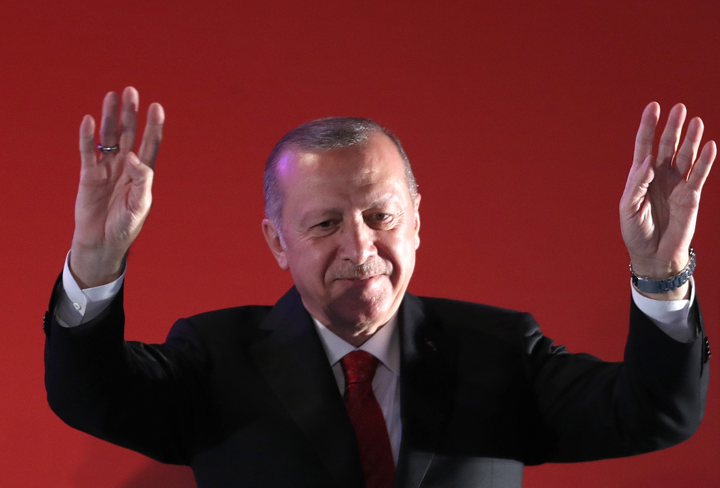 epa07719299 Turkish President Recep Tayyip Erdogan greets to people during a rally marking the third anniversary of the failed coup attempt, at the Ataturk Airport in Istanbul, Turkey, 15 July 2019. Turkey marks the third anniversary of the failed coup attempt which led to some 50 thousand workers being dismissed, some eight thousand people arrested, and scores of news outlets shut down by the government. Turkish military factions on 15 July 2016 attempted a coup for which Turkish President Recep Tayyip Erdogan blamed US-based Turkish cleric Fethullah Gulen and his movement to allegedly have masterminded the attempt.  EPA/ERDEM SAHIN
